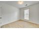 Bedroom featuring wood floors, white walls, and a window at 4648 Madeline Dr, Rock Hill, SC 29732