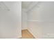 Walk-in closet with wood floors and shelves at 4648 Madeline Dr, Rock Hill, SC 29732
