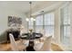 Bright dining room with a marble-top table, chandelier, and natural light at 4648 Madeline Dr, Rock Hill, SC 29732