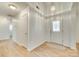 Bright entryway with white walls, wood-look floors, and a decorative front door at 4648 Madeline Dr, Rock Hill, SC 29732