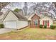 Charming single-story home featuring a brick accent, attached garage, and well-maintained lawn at 4648 Madeline Dr, Rock Hill, SC 29732