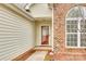 Inviting front entrance featuring a brick facade and a glass-paneled door at 4648 Madeline Dr, Rock Hill, SC 29732