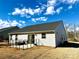 Charming home featuring a cozy fenced patio area, perfect for outdoor relaxation and entertaining under sunny skies at 505 Grandiflora Ave, Lancaster, SC 29720