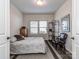 Guest bedroom with a chair and neutral colored bedding at 5220 Admirals Lndg, Lancaster, SC 29720