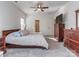 Bright bedroom with king-size bed, ceiling fan, and lots of natural light at 5220 Admirals Lndg, Lancaster, SC 29720