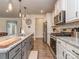Modern kitchen with granite countertops and stainless steel appliances at 5220 Admirals Lndg, Lancaster, SC 29720