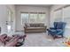 Relaxing sunroom with comfy seating and plenty of natural light at 5220 Admirals Lndg, Lancaster, SC 29720