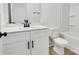 Clean bathroom with white vanity and bathtub at 5618 Pine St, Charlotte, NC 28269