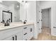 Elegant bathroom with double vanity, quartz countertop and a walk-in shower at 5618 Pine St, Charlotte, NC 28269