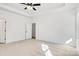 Well lit bedroom with carpet and an additional closet at 5618 Pine St, Charlotte, NC 28269