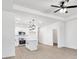 Modern kitchen featuring white cabinets, an island, and new appliances at 5618 Pine St, Charlotte, NC 28269