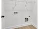 Laundry closet with shelving and hookups at 5618 Pine St, Charlotte, NC 28269