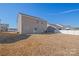 View of backyard and neutral siding at 7324 Teague Dr, Gastonia, NC 28056