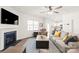 Bright living room boasts a fireplace, large window, and modern furnishings at 7324 Teague Dr, Gastonia, NC 28056