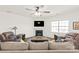 Cozy living room features a fireplace, ceiling fan, and comfortable seating at 7324 Teague Dr, Gastonia, NC 28056