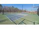 Community sports court area including tennis court and basketball court for sports activities at 7324 Teague Dr, Gastonia, NC 28056