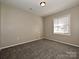 Spacious bedroom with neutral walls and carpeting at 738 Rudd Ct, Charlotte, NC 28216