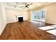 Bright living room with hardwood floors, fireplace, coffered ceiling and sliding doors at 7667 Maple Bluff Ln # 53, Concord, NC 28025