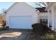 Attached garage with white door at 843 Fairway Dr # 44, Kannapolis, NC 28081