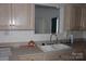 Bright kitchen featuring double sink and ample cabinetry at 843 Fairway Dr # 44, Kannapolis, NC 28081