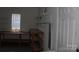 Workshop area with shelving and workbench, ideal for storage and projects at 843 Fairway Dr # 44, Kannapolis, NC 28081