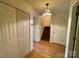 Hallway view features hardwood flooring and multiple closets at 1017 21St Ne Ave, Hickory, NC 28601