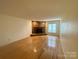 Spacious living room features a stone fireplace and natural light at 1017 21St Ne Ave, Hickory, NC 28601