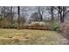 Simple backyard with grass and trees at 105 Valley Ave, Clover, SC 29710