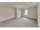 Bright bedroom with neutral walls, carpet, and window at 105 Valley Ave, Clover, SC 29710