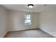 Spacious bedroom with neutral walls and carpeted floor at 105 Valley Ave, Clover, SC 29710