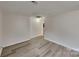 Clean and bright hallway with neutral colored walls and floors at 105 Valley Ave, Clover, SC 29710