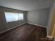 Bright bedroom with hardwood floors and large window at 1050 21St Nw Ave # 70, Hickory, NC 28601