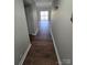 Bright entryway with hardwood floors leading to living room at 1050 21St Nw Ave # 70, Hickory, NC 28601