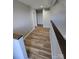 Upper level hallway with wood-look flooring at 1050 21St Nw Ave # 70, Hickory, NC 28601