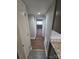 Long hallway with dark hardwood floors at 1050 21St Nw Ave # 70, Hickory, NC 28601