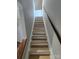 Clean carpeted stairs leading to the upper level at 1050 21St Nw Ave # 70, Hickory, NC 28601