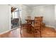 Dining area with wood table and chairs, access to screened porch at 10513 Danesway Ln, Cornelius, NC 28031