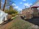 Side yard with deck and shed view at 10513 Danesway Ln, Cornelius, NC 28031