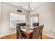 Dining area with a wooden table and four chairs at 1110 Kirkland Ct, Concord, NC 28025