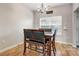 Small dining area with wooden table and chairs at 1110 Kirkland Ct, Concord, NC 28025