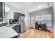 Kitchen with stainless steel appliances, white countertops, and access to backyard at 1110 Kirkland Ct, Concord, NC 28025