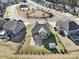 Aerial view of a home featuring a fenced backyard with a patio and fire pit, and a community pool and playground at 1169 Hollis Sw Cir, Concord, NC 28025