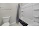 The bathroom has a tiled floor, a shower/tub, and a light gray shower curtain at 1169 Hollis Sw Cir, Concord, NC 28025