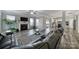 Cozy living room with fireplace, modern furniture, and a view into the kitchen at 1169 Hollis Sw Cir, Concord, NC 28025