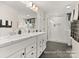 Elegant bathroom with double vanity, large shower, and hexagon tile floor at 118 Ryan Ln # 7139, Mooresville, NC 28115