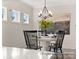 Formal dining room with round table, black chairs, and art on the wall at 118 Ryan Ln # 7139, Mooresville, NC 28115