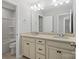 Bathroom featuring a large mirror, double sinks and vanity at 14106 Magnolia Walk Dr, Huntersville, NC 28078