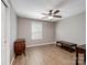 Empty bedroom shows hardwood floors, a ceiling fan, and neutral paint at 14106 Magnolia Walk Dr, Huntersville, NC 28078