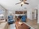 Open-concept living room flowing into a modern kitchen with stainless appliances at 14106 Magnolia Walk Dr, Huntersville, NC 28078