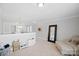 Spacious hallway with seating area and mirror at 174 Country Lake Dr, Mooresville, NC 28115